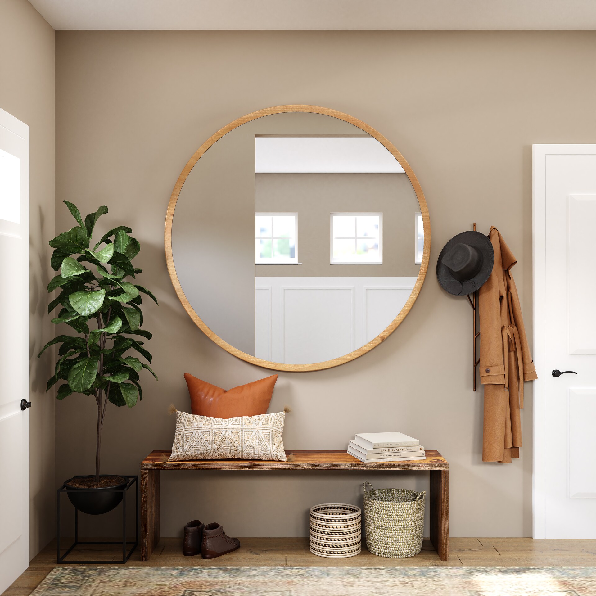 A large round mirror hanging in a hallway.